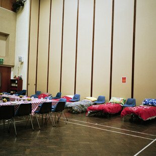 A row of beds in Torquay church hall.