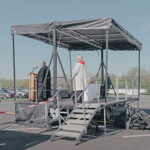 With indoor worship prohibited, an ecumenical Good Friday service is held at a drive-in cinema in Düsseldorf.