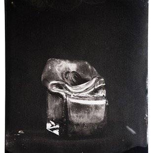 Tintype of a glass vase destroyed by a wildfire in California.